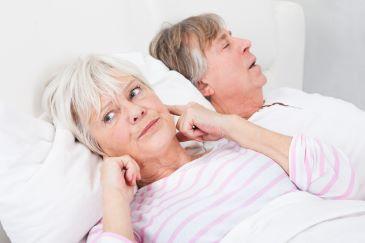snoring treatment rutland | woman awakened from snoring partner